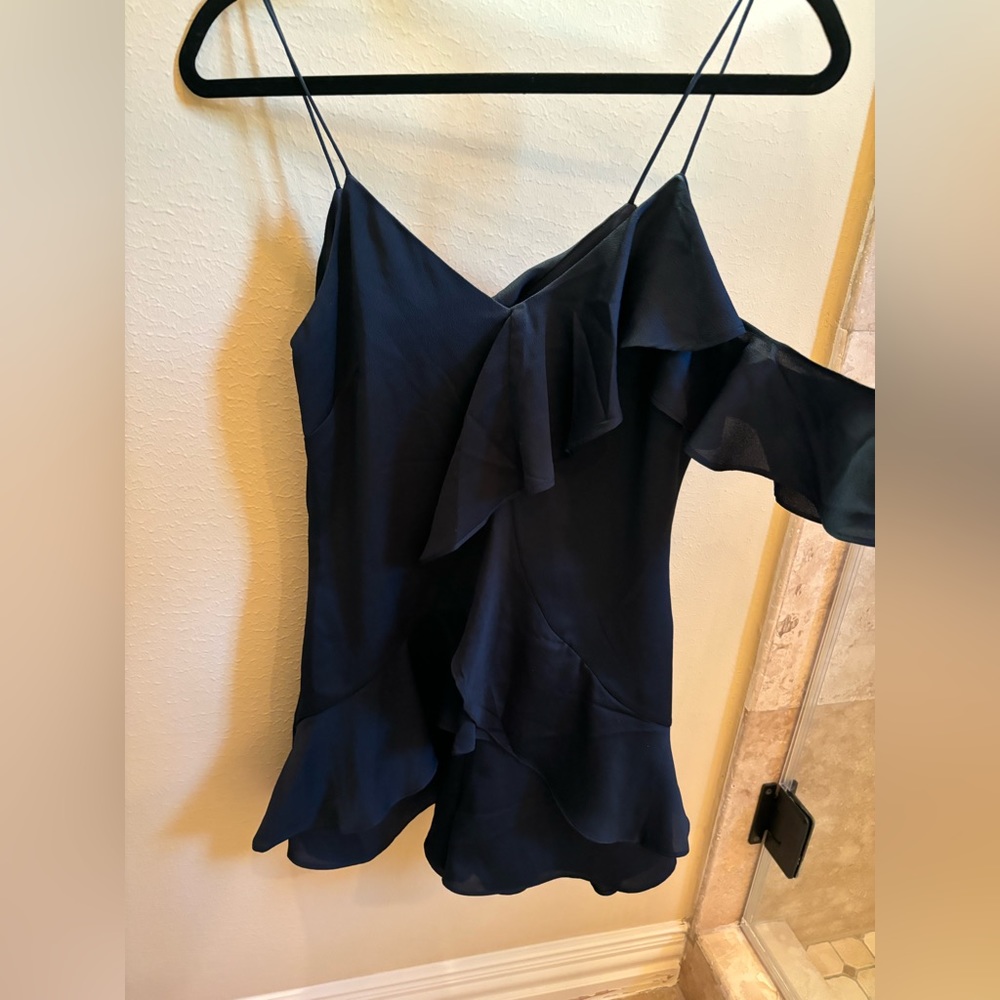 Brand is Keepsake from Free People! Dark navy romper, size small